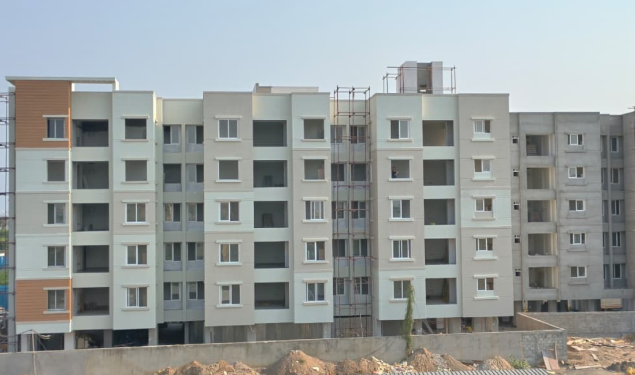 An image of North Side View. showing construction status of DRA Trinity residential Flats in Thoraipakkam, Chennai as on 14th May 2026